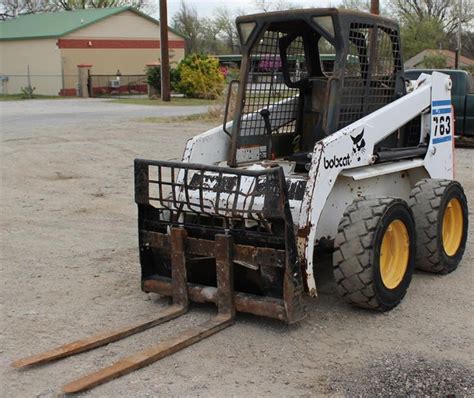 skidsteer 763 belly pan